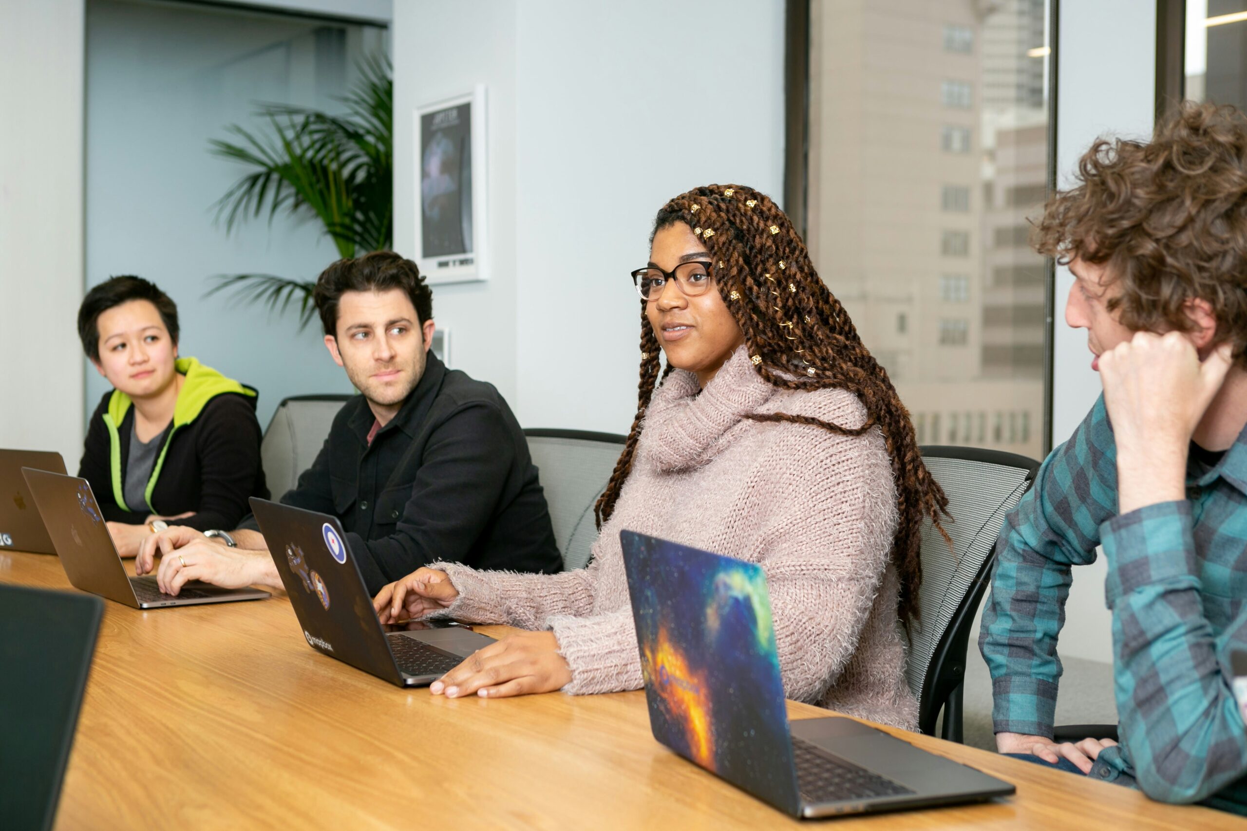 Manhattan coworkers sitting together doing a professional development training
